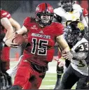  ?? Arkansas Democrat-Gazette/THOMAS METTHE ?? Quarterbac­k Justice Hansen threw five touchdown passes, tying the Arkansas State record, to five different receivers. Hansen totaled 336 passing yards.