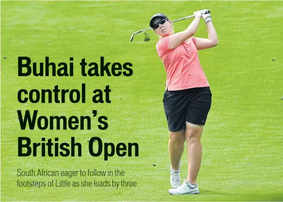  ??  ?? South Africa’s Ashleigh Buhai plays a shot on the seventh hole on the second day of the Women’s British Open at Woburn on Friday.