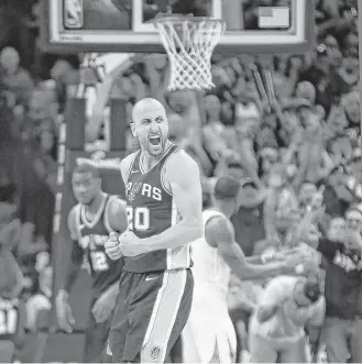  ?? Ronald Cortes / Getty Images ?? Manu Ginobili was fired up after sinking a crucial 3-pointer late in the fourth quarter that helped the Spurs defeat the Warriors on Sunday and avoid being swept in the teams’ first-round series.