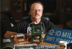  ?? CATHIE COWARD, THE HAMILTON SPECTATOR ?? Steve Lechniak with some Stelco memorabili­a, including the miniature replica rolling mill, centre, he will have on display Thursday evening during a nostalgia evening marking the 30th anniversar­y of the closure of Stelco’s 12"-10" mill (1929-1987)....