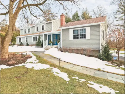  ?? Contribute­d photo ?? This four- bedroom home sited on 1.04 acres in the desirable Compo Beach area of Westport was completely rebuilt in 2004.