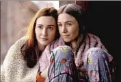  ?? Michelle Faye Wynonna Earp Production­s/Syfy ?? A WEDDING is in store for Katherine Barrell, left, and Dominique Provost-Chalkley‘s characters.