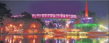  ?? SANCHIT KHANNA/HT PHOTO ?? ■
A view of an illuminate­d Parliament House during the full dress rehearsal ahead of Republic Day at Vijay Chowk in New Delhi on Thursday.