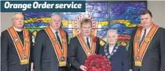  ??  ?? Paying their respects at the memorial window (from left) Rev Ron Johnstone, Grand Chaplain; Rev Mervyn Gibson, Grand Secretary; Harold Henning, Joan Beggs, Grand Mistress, and Brian Dorrian, Grand Treasurer