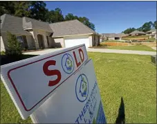  ?? ROGELIO V. SOLIS — THE ASSOCIATED PRESS FILE ?? Homeowners are increasing­ly tapping their equity, taking advantage of big gains following years of soaring housing prices. Some 333,537 home equity loans were taken out by homeowners in the third quarter of 2022, according to data from TransUnion.