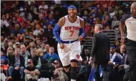  ?? Photograph: Jesse D Garrabrant/NBAE/Getty Images ?? Carmelo Anthony walks away from the NBA after finishing his career with 28,289 points.