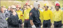  ?? Picture: EWALD STANDER ?? SAD FAREWELL: Ian Barnard and other firefighte­rs at the memorial service for Bradley Richards yesterday