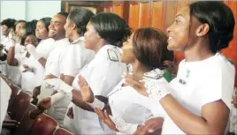  ??  ?? Graduates sing and dance during the 2019 Mpilo Central Hospital Nurses and Midwives Prize Giving and Graduation ceremony held at Large City Hall in Bulawayo yesterday. (Picture by Nkosizile Ndlovu)