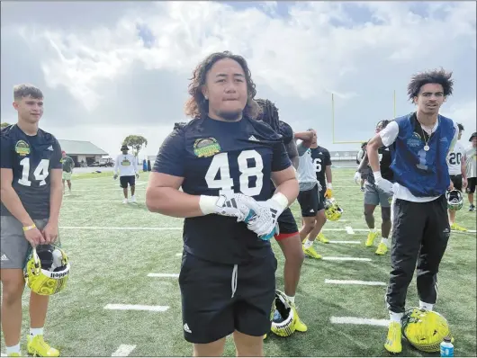  ?? KHON2 / ROB DEMELLO photo ?? Maui High School senior linebacker Ofa Falekaono looks on Wednesday during a Polynesian Bowl practice at Kamehameha Schools Kapalama. The prestigiou­s prep all-start game will be televised on NFL Network on Friday at 4 p.m.