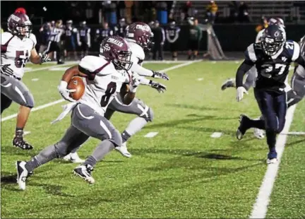  ?? RANDY MEYERS — THE MORNING JOURNAL ?? Rocky River’s Dameon Crawford picks up blockers and runs for a touchdown against Valley Forge.