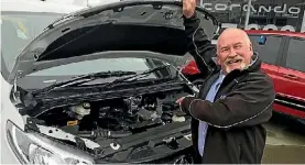  ??  ?? Yep, that’s a Mitsubishi engine in there - Great Lakes managing director Rick Cooper points to what’s under the bonnet of an LDV G10 van.