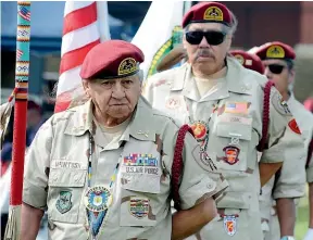  ?? AP ?? Butch McIntosh, left, leads the Muscogee (Creek) Nation honour guard during the opening of a two-day festival in Oxford, Alabama. The Muscogee name for the event is ‘‘Reyicepes’’, or ‘‘We have come back’’, signifying an attempt by the nation to re-establish a presence in the southeast nearly 200 years after their ancestors were forced out of the region to make way for white settlers.