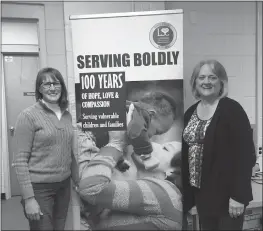  ??  ?? Amy Henderson, left, and Bonnie Ramon, right, delivered hundreds of items to Lutheran Social Services in Hyattsvill­e to donate to refugees resettling in the Washington, D.C., area.