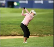  ?? The Associated Press ?? LATE STRUGGLES: Lexi Thompson of the US tees off on the 18th hole Thursday during the AIG Women’s British Open at Woburn Golf Club, Little Brickhill, England. Thompson finished at 1-under 71 for the day, six strokes behind leader Ashleigh Buhai.