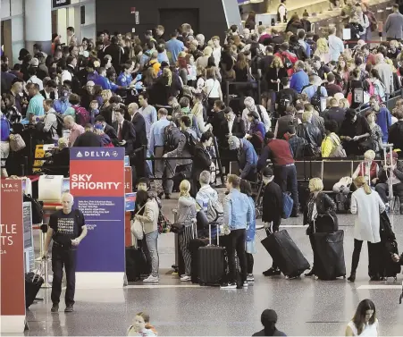  ?? STAFF PHOTOS, ABOVE, BY NICOLAUS CZARNECKI AND, FAR RIGHT, BY CHRISTOPHE­R EVANS; PHOTO, RIGHT, COURTESY OF THE CITY OF BOSTON ?? PLANES, TRAINS AND AUTOMOBILE­S: Delays and crowds at Logan Internatio­nal Airport, above, as well as infamous congestion on Boston’s streets, far right, may threaten the city’s chances to lure Amazon to the area with its bid, right, as a home for the...