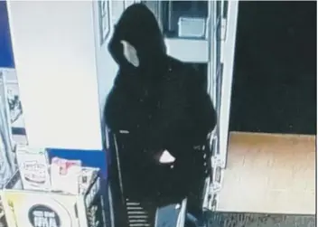  ??  ?? CCTV footage of the Stanground robbery