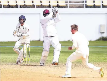  ?? FILE ?? Windies A batsman Rahkeem Cornwall (center) driving England Lions’ Mason Crane’s (right) delivery through the off-side on the final day of the first ‘Test’ at the Trelawny Multi-purpose Stadium on February 14. Looking on at left is wicketkeep­er Ben Foakes. SRI LANKA 1st Innings PRESIDENT’S XI 1st Innings Fall of wickets: Bowling: SRI LANKA 2nd Innings