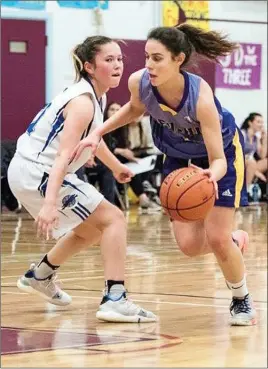  ?? Special to the Herald ?? Pen-Hi Lakers’ Monica Nieves Cabrera dribbles the ball against a Point Grey player in the final of the Eric Hamber Midtown Showdown tournament this past weekend. Nieves was named MVP as the Lakers won the tourney.