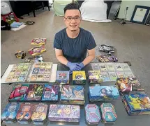  ?? ALDEN WILLIAMS/STUFF ?? Christchur­ch man Chris Chen has an extensive collection of Pokemon cards. He plans to sell off some to add to a house deposit.