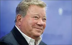  ?? THE CANADIAN PRESS/AP-STEVEN SENNE ?? When it comes to talking about his new album, William Shatner is like a kid on Christmas morning. Shatner smiles while taking questions from reporters in Providence, R.I. in May.