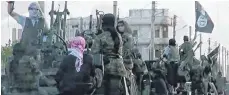  ?? FOTO: AFP PHOTO/HO/AL-FURQAN MEDIA ?? IS-Kämpfer im März 2014 in der nordsyrisc­hen Stadt Homs.