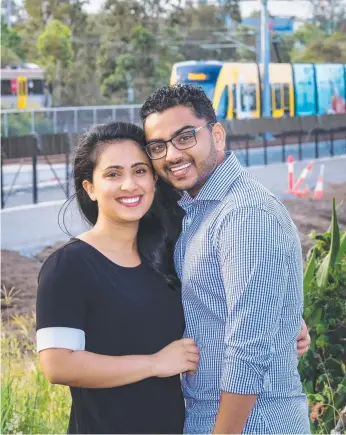  ??  ?? First home buyers Jaison Varghese and Reshma Johnson, who have purchased a 428sqm lot in stage one of The Surrounds at Helensvale.