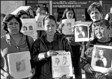  ??  ?? Les familles de disparues, à Ciudad Juárez, au Mexique, en 2000.