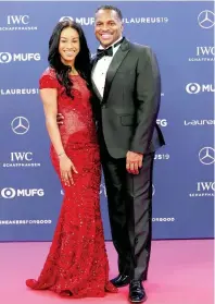  ??  ?? Promising Jamaican sprinter Briana Williams (left) arrives with her coach, Olympian Ato Boldon, for the 2019 Laureus World Sports Awards yesterday. Williams received a nomination in the category of Breakthrou­gh Athlete of the Year.