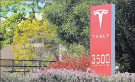  ??  ?? Getty Images Tesla’s headquarte­rs is seen in Palo Alto, California. Details of the company’s
$1.5 million investment in science education in Nevada were announced at Thursday’s State Board of Education meeting.