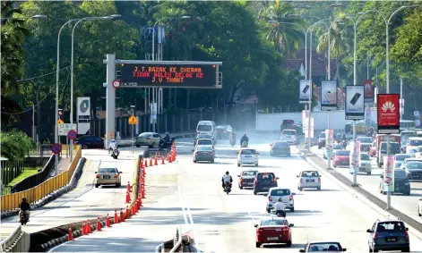  ?? — Bernama photo ?? Analysts expect the auto sector to resume operations (on the assembly, manufactur­ing and reopening of showrooms) in either July or August 2021 as the nation gradually moves from phase 1 of MCO 3.0.