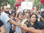  ?? BIPLOV BHUYAN/HT ?? ■ Members of Sabarimala Ayyappa Seva Samajam protest against the Supreme Court verdict that allowed entry to women of all ages into the Sabarimala Temple, in New Delhi.