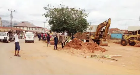  ??  ?? Bulldozers stationed near the Ereja shrine in Ikere Ekiti. Doyin Adebusuyi