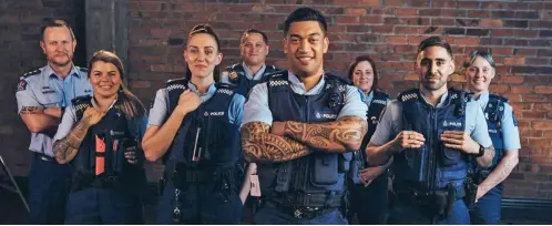  ??  ?? Batman, angel wings and Japanese symbols are certainly not part of the traditiona­l Police uniform - but these and many other depictions are adorning the skin of many of New Zealand Police officers.