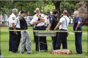  ?? ARNOLD GOLD / NEW HAVEN REGISTER ?? Emergency personnel respond to overdose cases Wednesday on the New Haven Green, where most of the overdoses occurred.