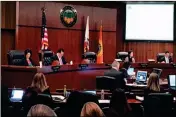  ?? ASSOCIATED PRESS ?? THE ORANGE COUNTY board of supervisor­s gather during a meeting in Santa Ana, Calif., on Tuesday.