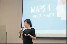 ?? [PAXSON HAWS PHOTOS/ THE OKLAHOMAN] ?? Oklahoma County Commission­er Carrie Blumert presents new details from her Maps 4 mental health proposal to the audience at a mental health town hall Monday.