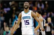  ?? ASSOCIATED PRESS ?? THIS MARCH 26, file photo shows Charlotte Hornets’ Kemba Walker (15) reacting after making a basket against the San Antonio Spurs during the second half of a game in Charlotte.