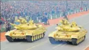  ?? HT FILE PHOTO ?? Army tanks pass through the saluting base during the full dress rehearsal for Republic Day Parade at Rajpath.