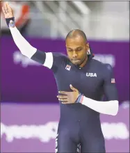  ?? Petr David Josek / Associated Press ?? Shani Davis of the U.S. waves after the men’s 1,000-meter speedskati­ng race in what is believed to be his last Olympic race at the Winter Olympics in Gangneung, South Korea, on Friday. Davis blew off the media by slipping out a back door, having...