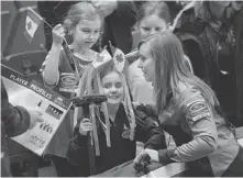  ?? ANDREW VAUGHAN/ THE CANADIAN PRESS ?? Ottawa skip Rachel Homan meets young fans after her Canadian team defeated Germany 7-5 on Wednesday.