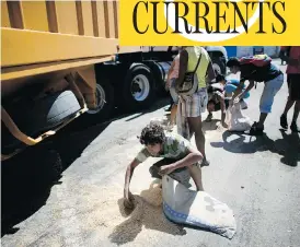  ?? ARIANA CUBILLOS / THE ASSOCIATED PRESS ?? As millions of Venezuelan­s go hungry this year, food traffickin­g has become one of the most lucrative businesses in the country.