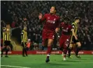  ??  ?? Virgil van Dijk of Liverpool celebrates scoring his second of the night. Photograph: Andrew Powell/Liverpool FC via Getty Images