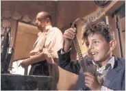  ??  ?? CLASSIC: Giuseppe Tornatore’s 1988 tear-jerker Cinema Paradiso.