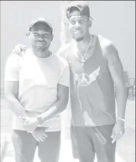  ??  ?? Guyana’s 2018 Commonweal­th Games triple-jump gold medallist, Troy Doris and Bahamas’ Leevan Sands, bronze medalist at the 2008 Olympic Games, the World Championsh­ip and Commonweal­th Games pose yesterday following the final press conference yesterday at...