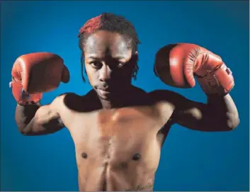  ?? Joe Klamar Afp/getty Images ?? RAU’SHEE WARREN, now 25, lost in his first bout at the Athens Games in 2004 and again at Beijing in 2008.