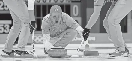  ?? ASSOCIATED PRESS ?? U.S. skip John Shuster of Superior, Wis., throws a stone during an 8-4 victory over Switzerlan­d. The win came a day after the team knocked off gold medal favorite Canada.