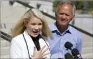  ?? RICK BOWMER — THE ASSOCIATED PRESS ?? Elizabeth Smart speaks during a news conference while her father Ed Smart looks on Thursday in Salt Lake City. Smart says it appears there is no viable, legal recourse she can take to stop the release of one of her kidnappers.