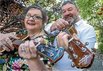  ?? PHOTO: DOUG FIELD/STUFF ?? Fi and Hugh McCafferty are hoping to give less experience­d ukulele players a chance to shine during their new event.