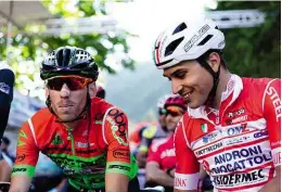  ??  ?? Below: Pro rider Matteo Malucelli (right) races at Procontine­ntal level for Italian team Androni