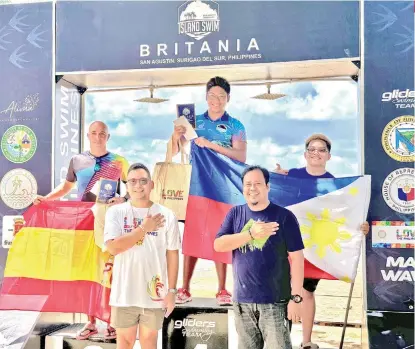  ?? CONTRIBUTE­D PHOTO VIA PAOLO MIGUEL LABANON ?? 1-2 FINISH.
Davao City’s Paolo Miguel Labanon, center, and Eirron Seth Vibar, third, celebrate their podium finishes in the Epic Island Adventure Race 202024 8K Certificat­ion Swim held at Britania, San Agustin, Surigao del Sur on Saturday, March 23, 2024.